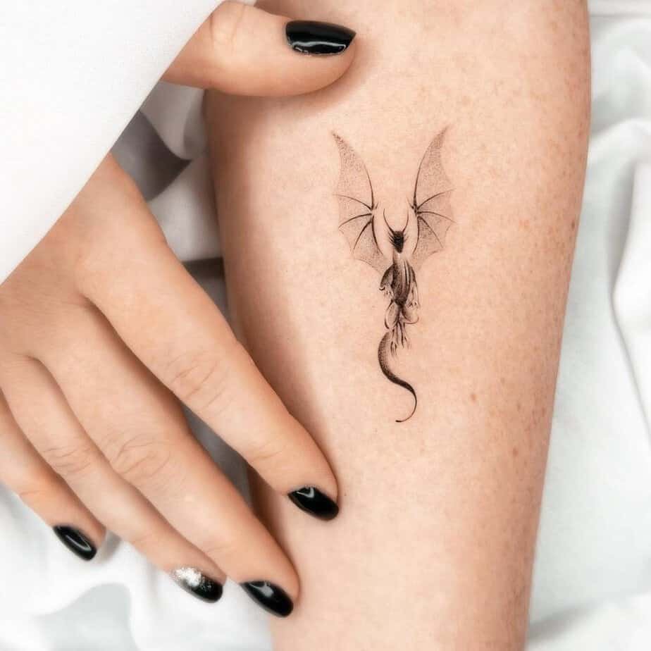 Small dragon tattoo