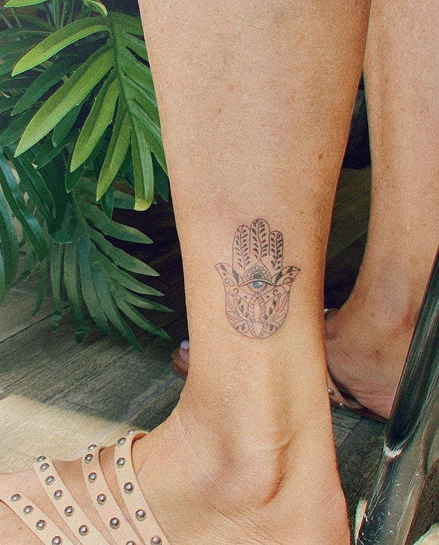 Hamsa hand with boho charm on the ankle