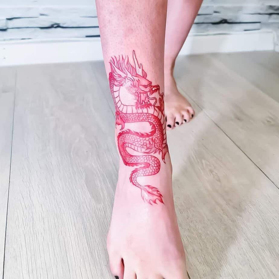 14. A red dragon tattoo on your shin