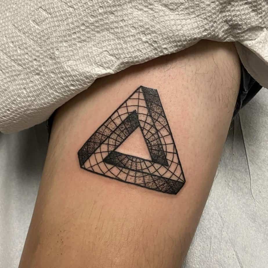 Spider web Penrose triangle on the thigh