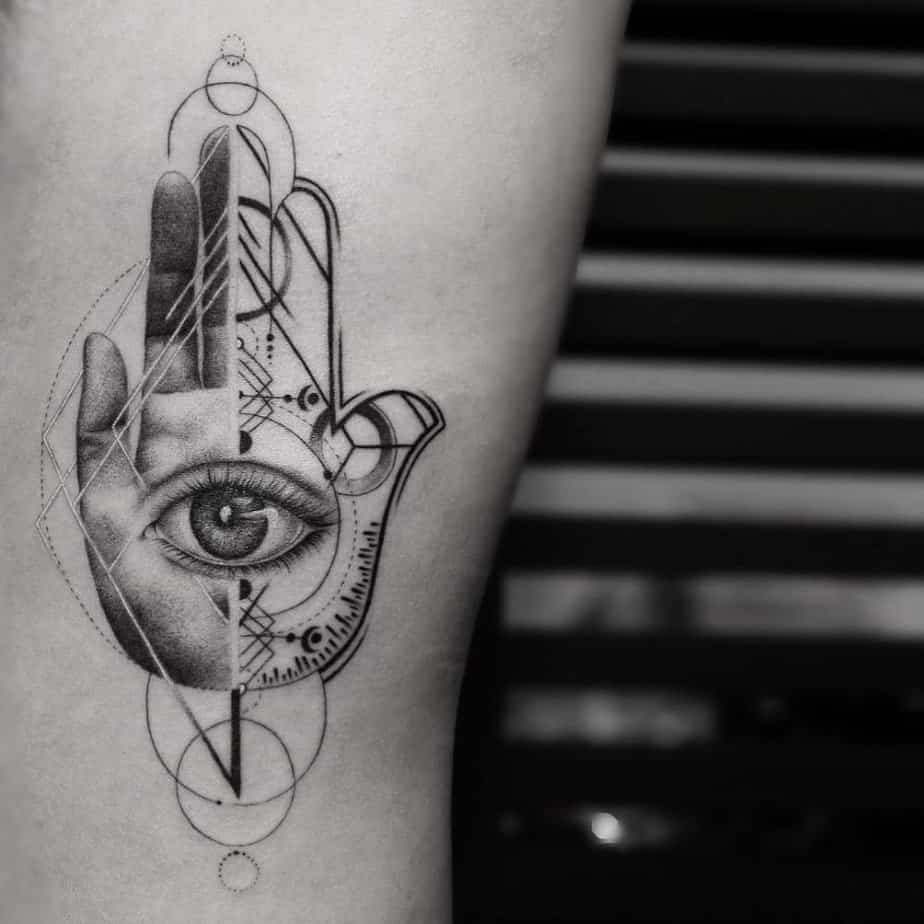 Geometric hamsa hand with detailed eye