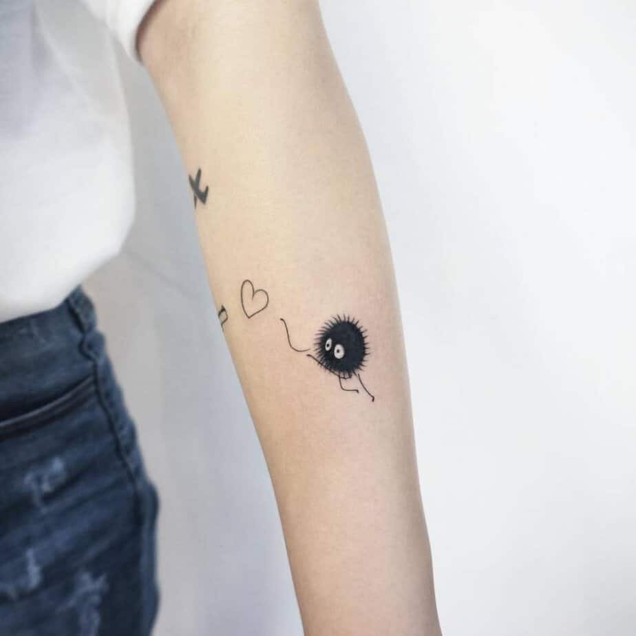 Soot sprite heart tattoo