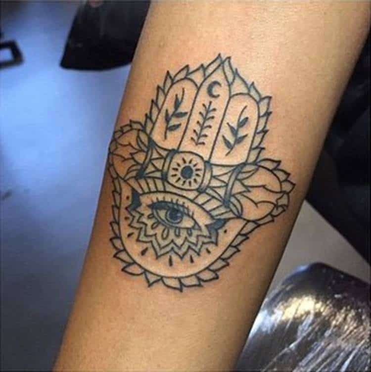 Bold hamsa hand with traditional details