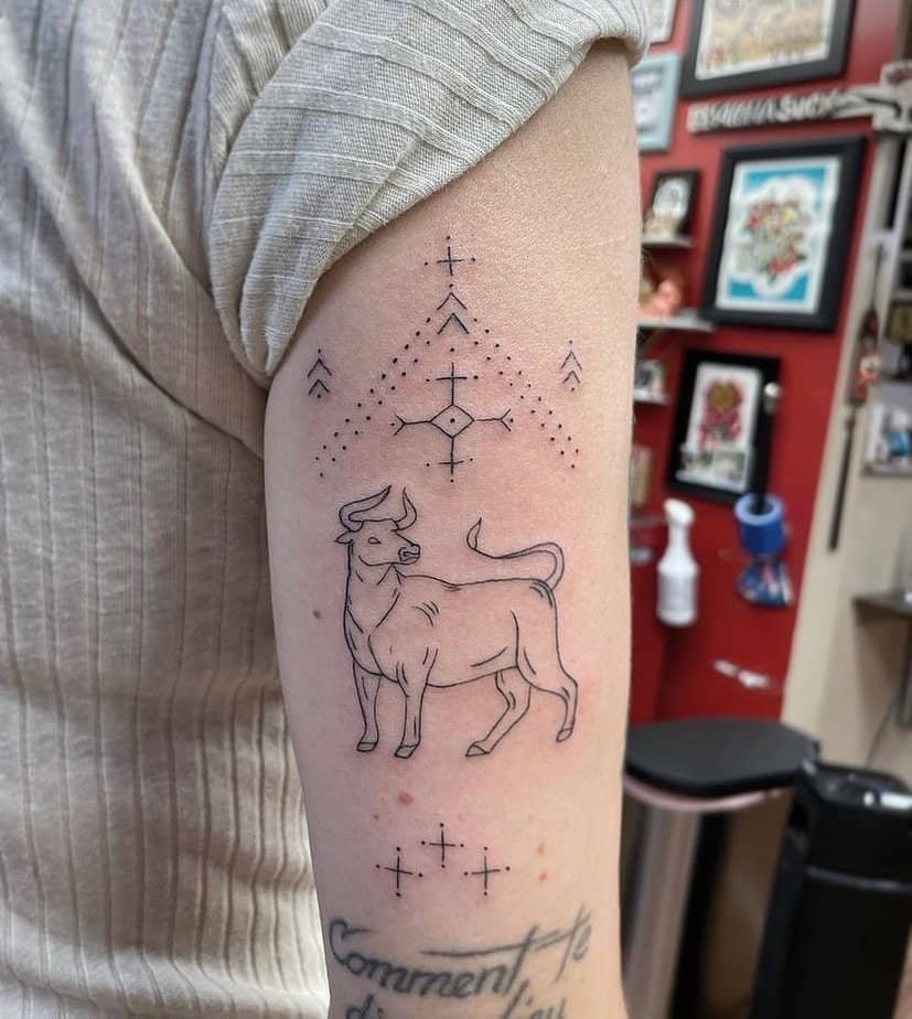 Minimalist bull outline with stars above