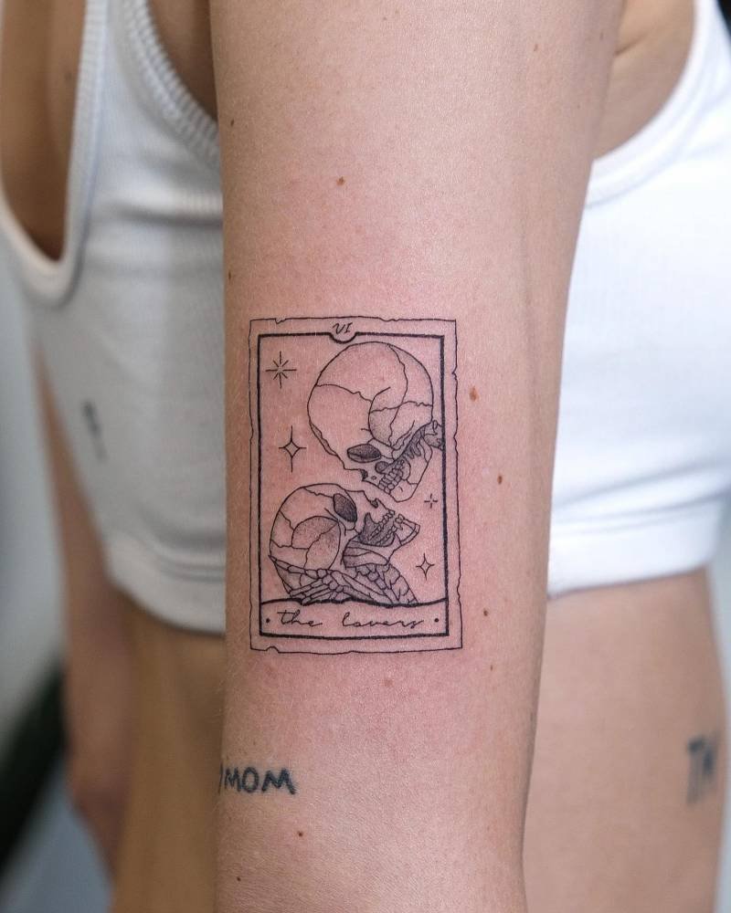 The lovers tarot tattoo with skulls