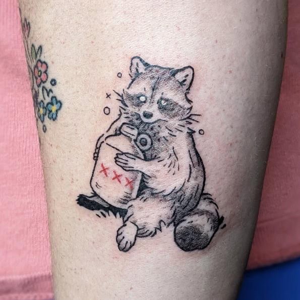 Drunk raccoon tattoo