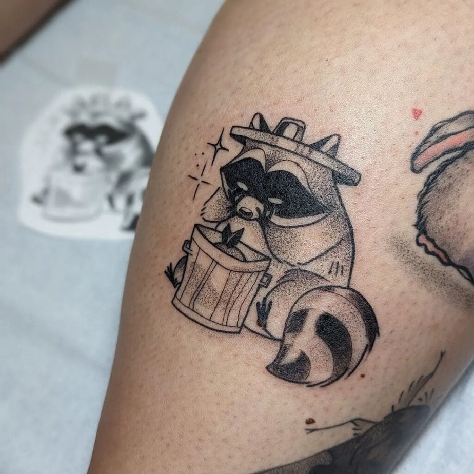 Happy raccoon tattoo