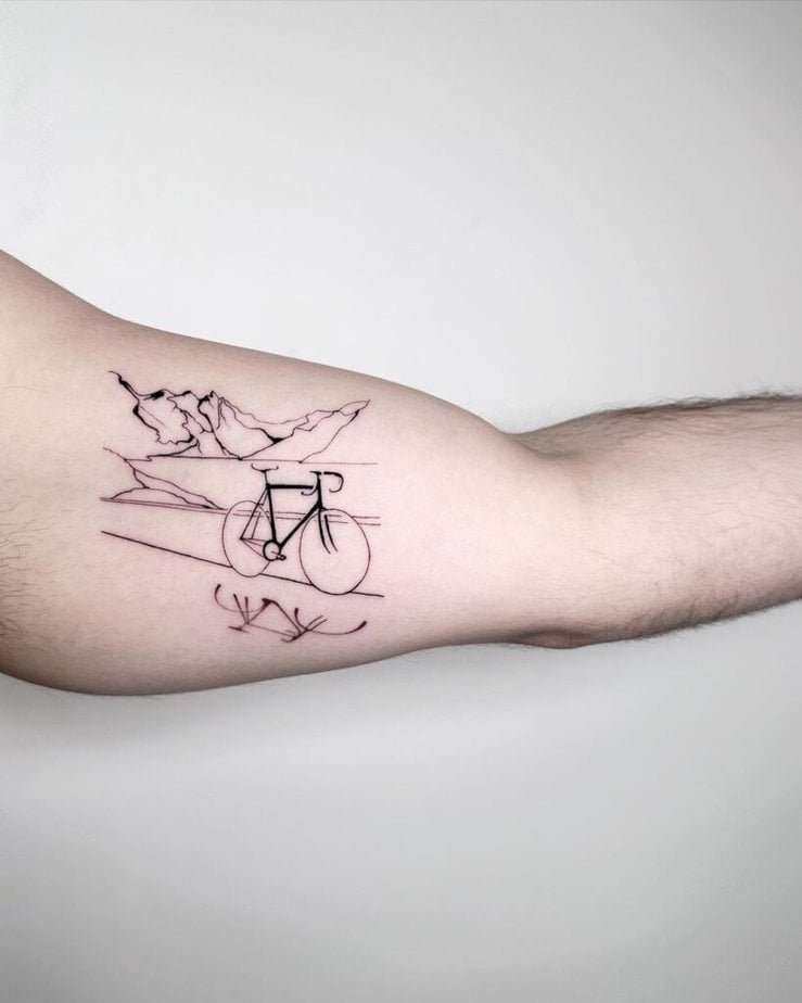 12. Fine-line bicycle tattoo