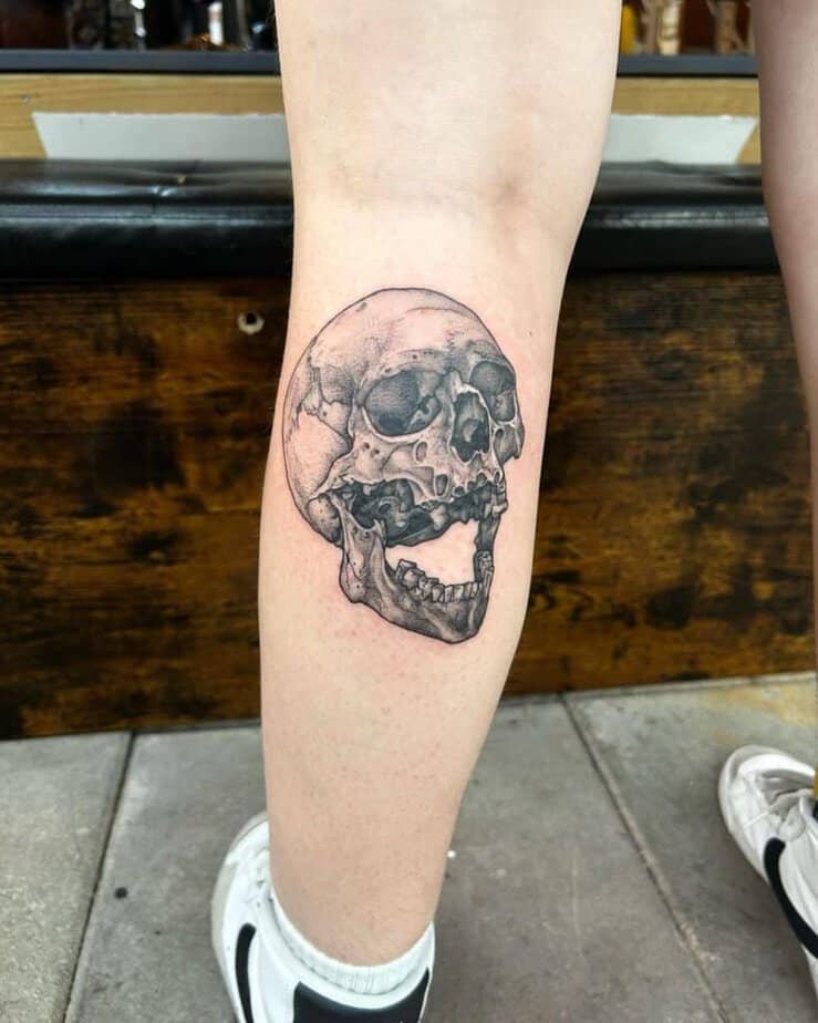 Skull calf tattoo