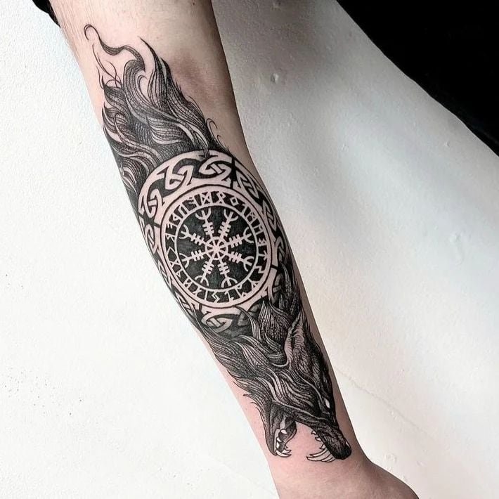 5. Majestic Nordic wolf design with runes