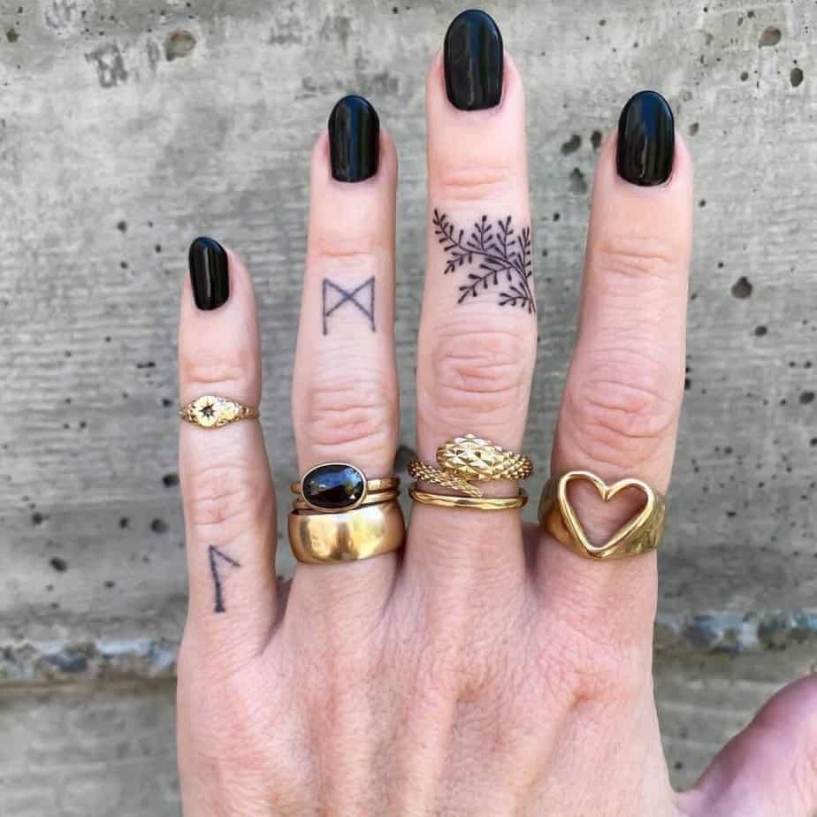 6. A finger fern tattoo