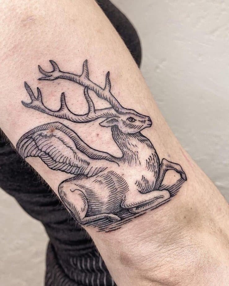 19. A winged deer tattoo
