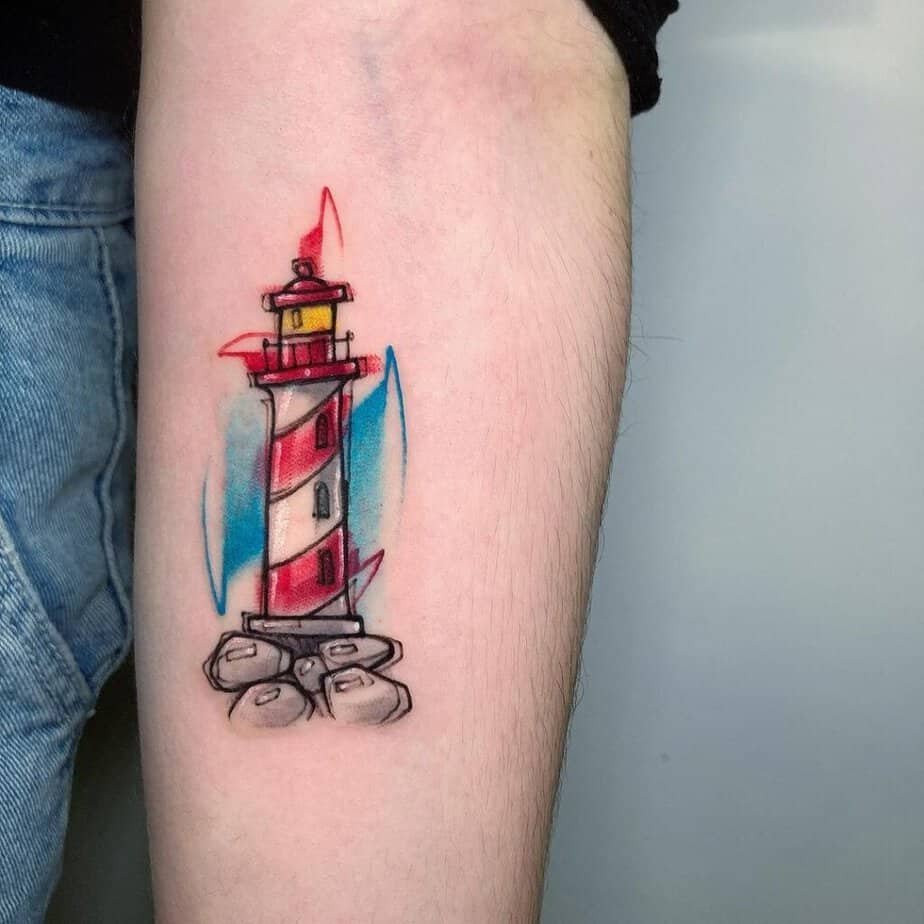 18. Tiny colorful tattoo