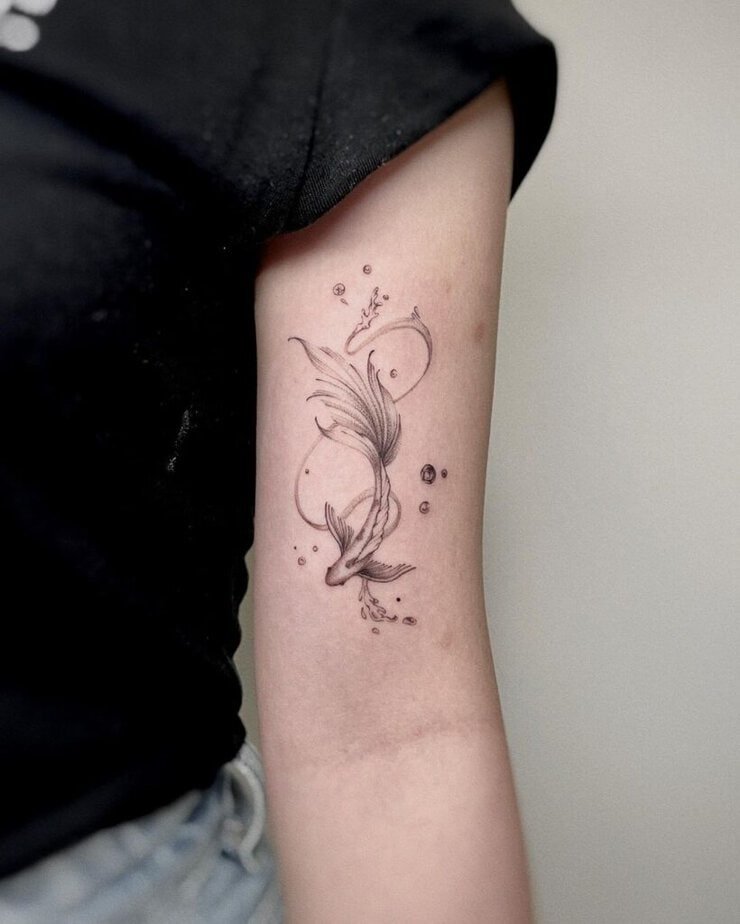 8. A beautiful koi fish tattoo