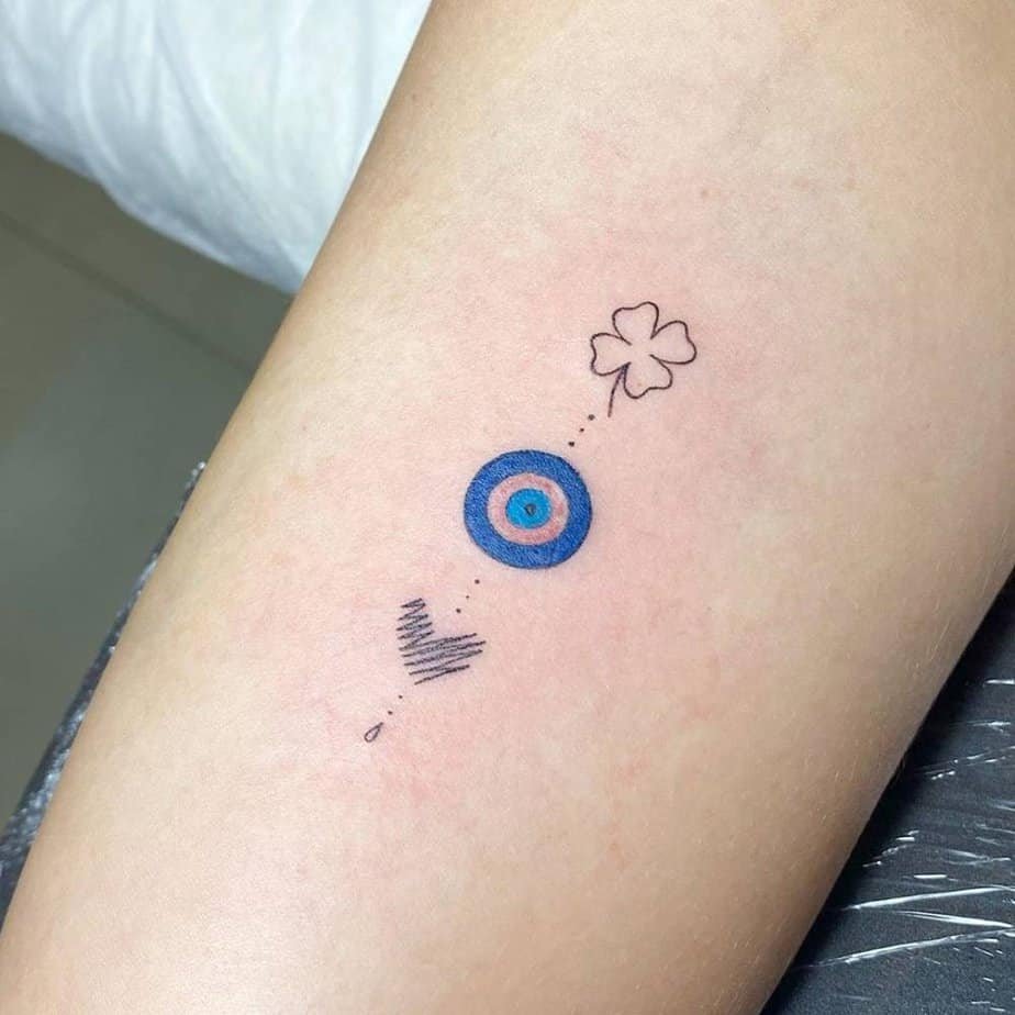 Clover with the evil eye for protection and luck