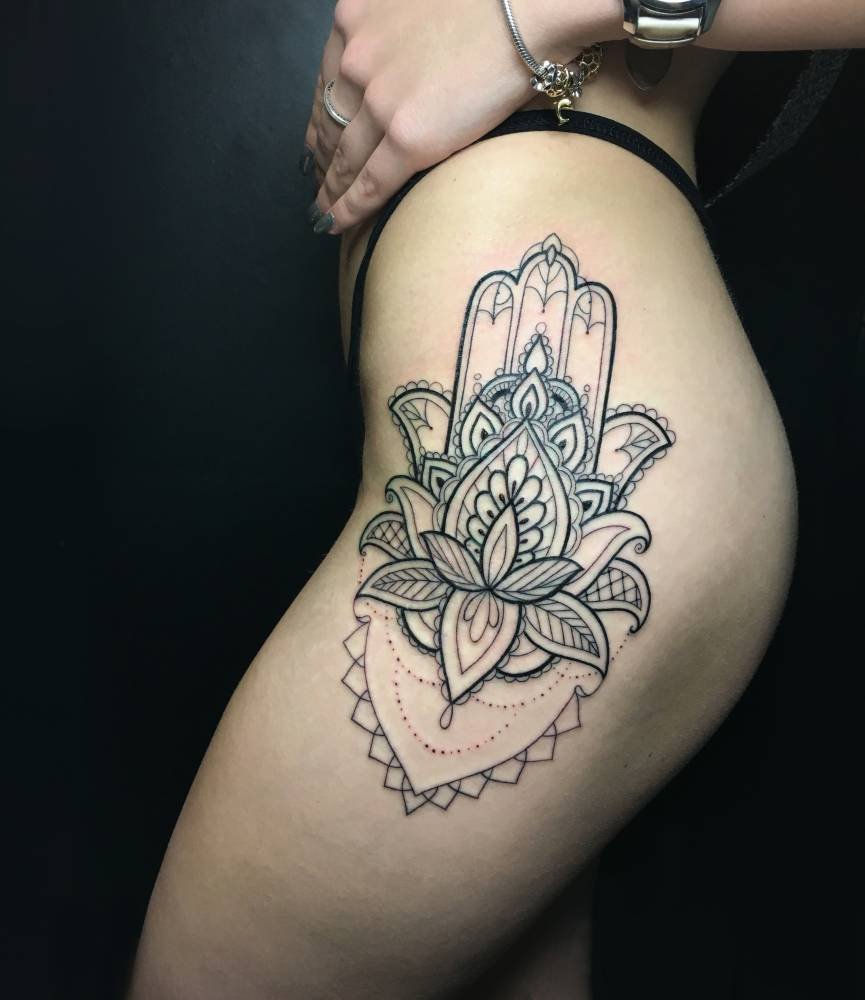 Intricate mandala hamsa hand