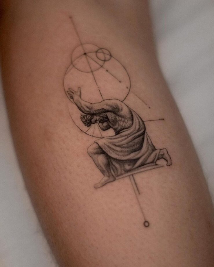 11. A small and simple Atlas tattoo 