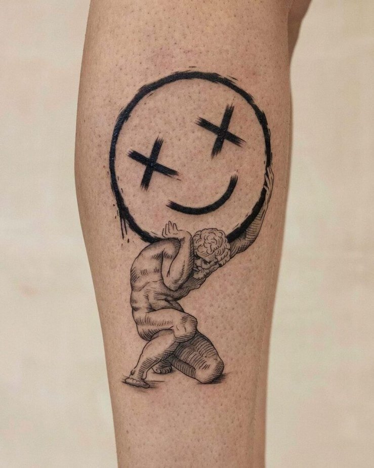 14. A tattoo of Atlas holding a smiley face
