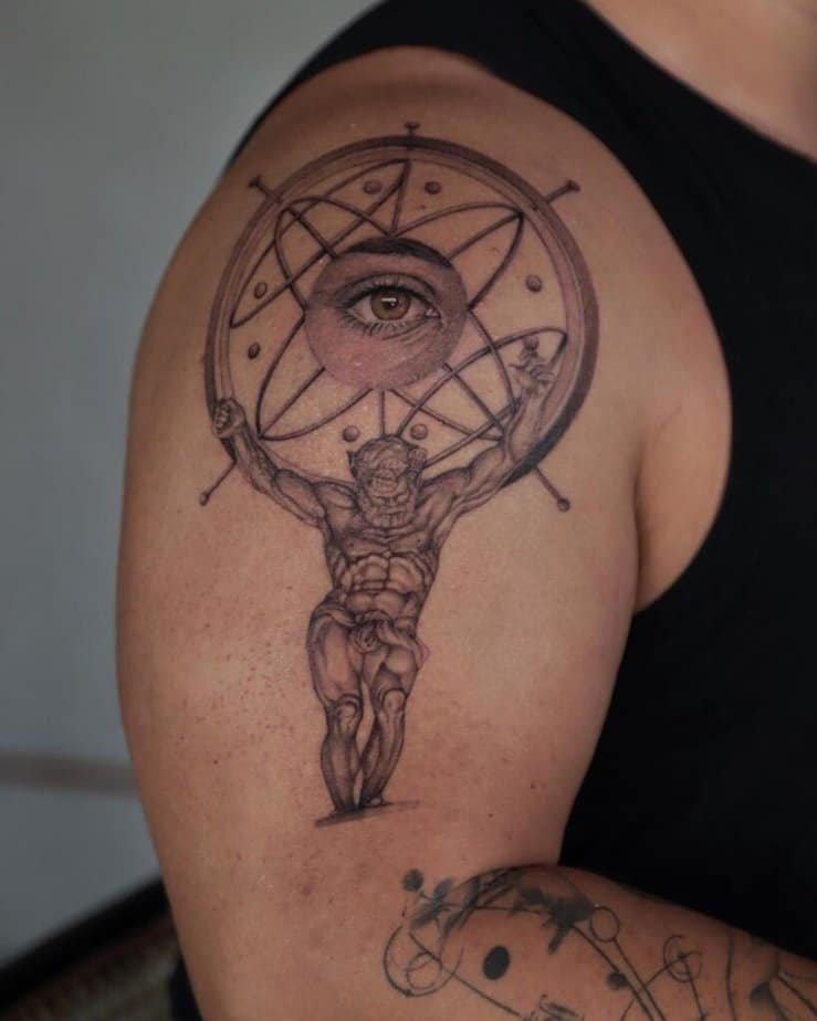 20. A tattoo of Atlas on the upper arm