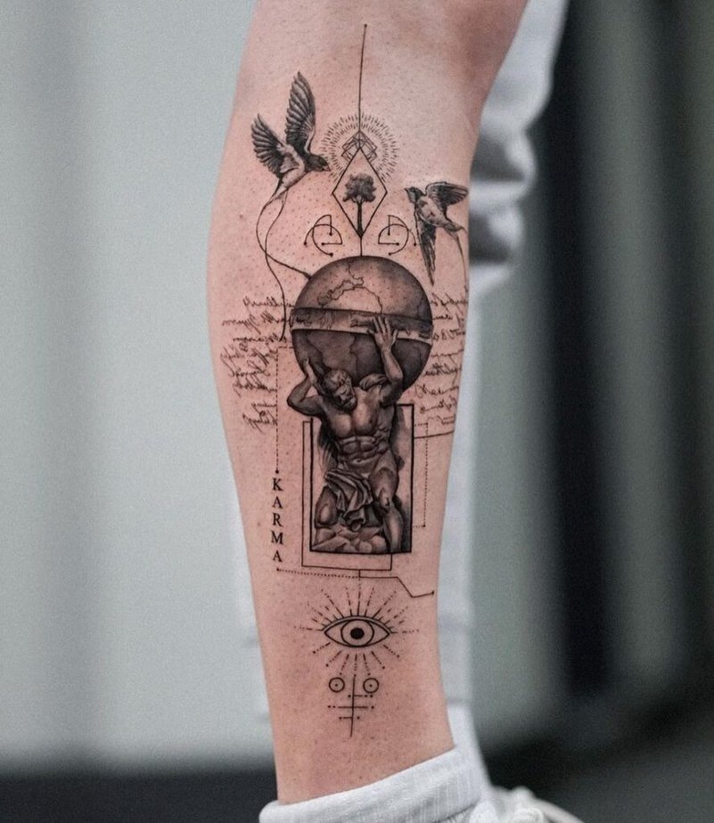 9. A delicate Atlas tattoo on the leg