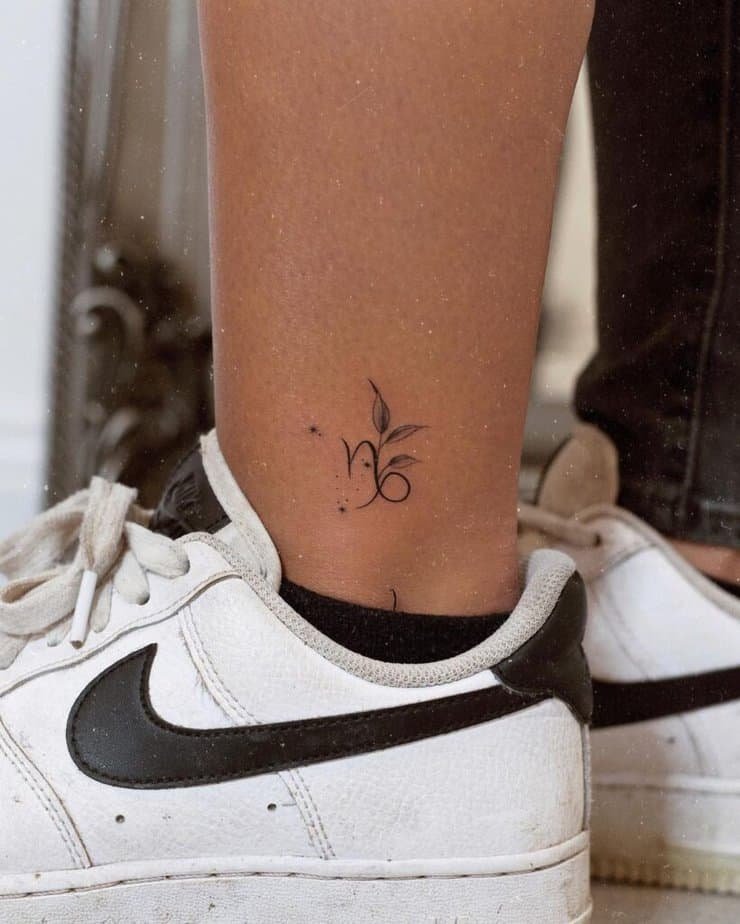 16. A Capricorn symbol tattoo on the ankle 