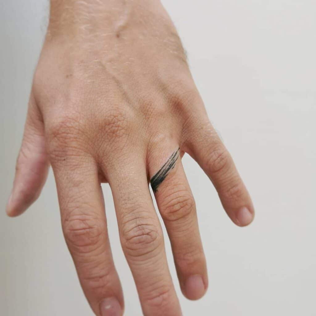 23 Ring Tattoos So Gorgeous You’ll Pin Them Immediately