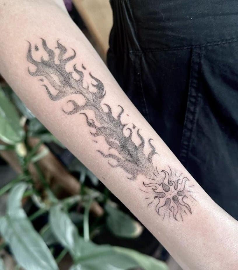 15. A tattoo of a shooting star on the forearm