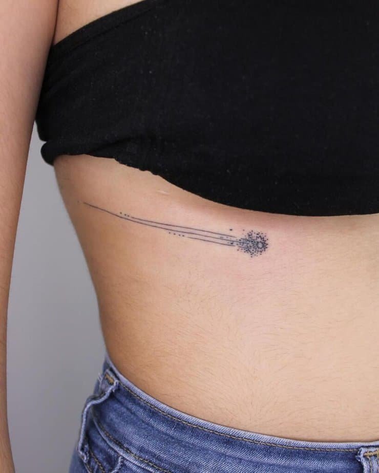 5. A tattoo of a shooting star on the ribcage