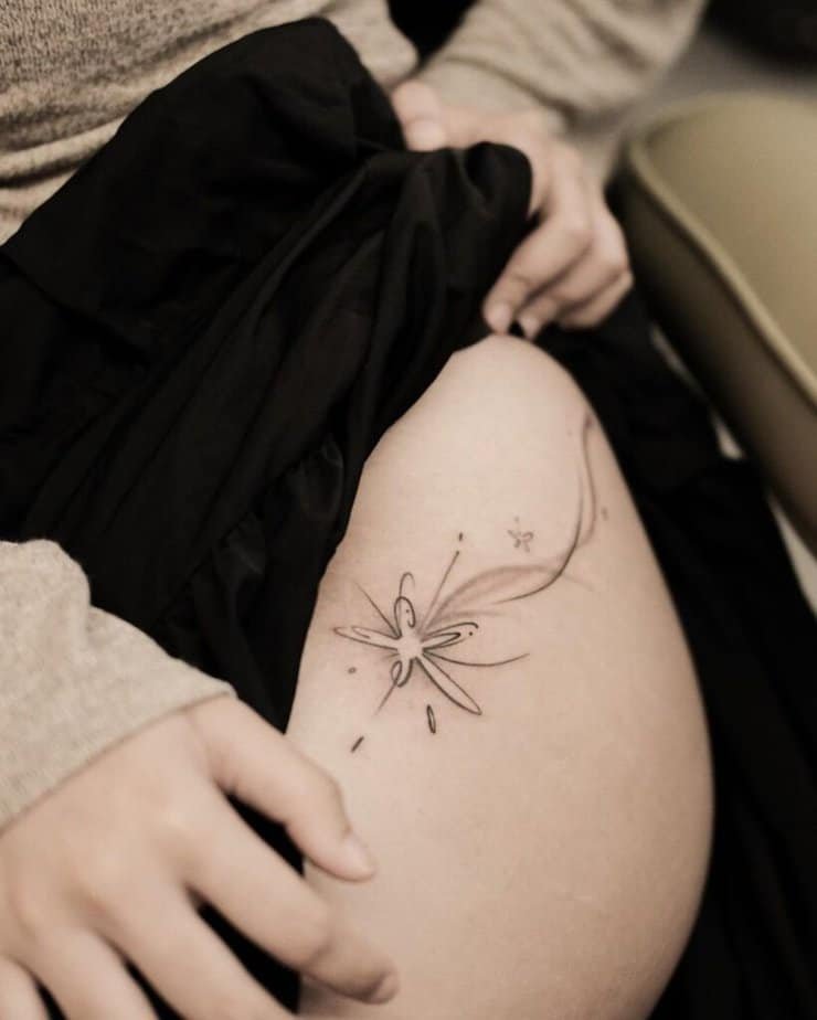 6. A shooting star tattoo on the hip