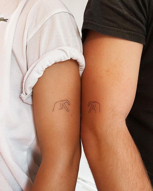10. Heart-shaped matching couple tattoos