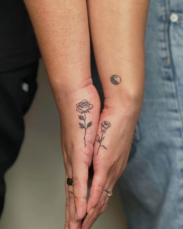 8. Gorgeous rose couple tattoos
