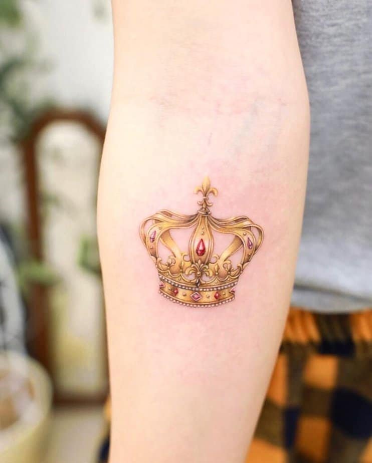 14. A realistic crown tattoo