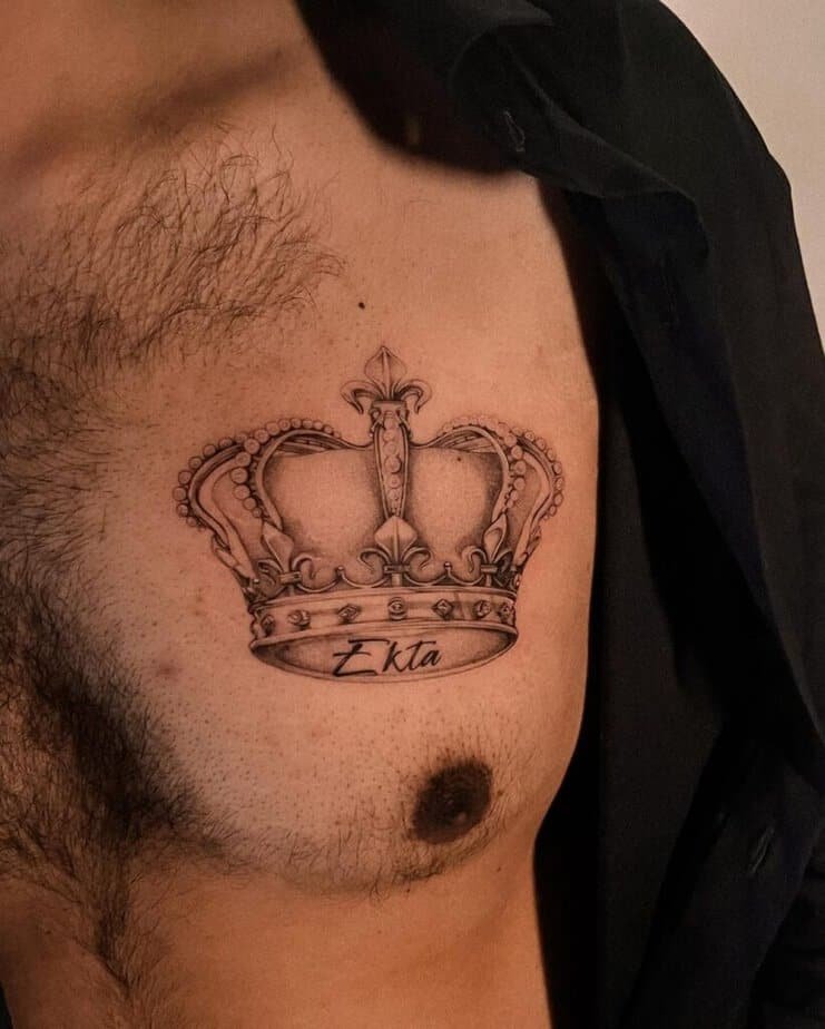 19. A big and bold crown tattoo on the chest