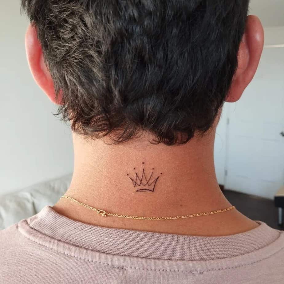 3. A linework crown on the back of the neck