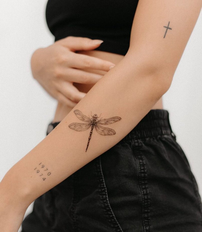 20. A sticker sleeve dragonfly tattoo