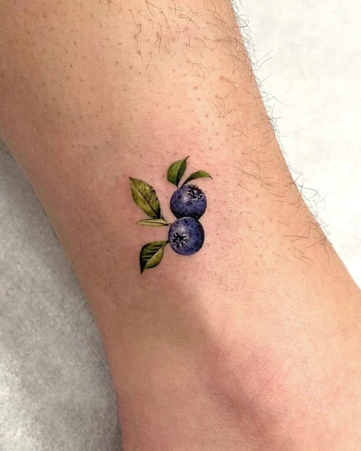 3. A blueberry tattoo on the ankle