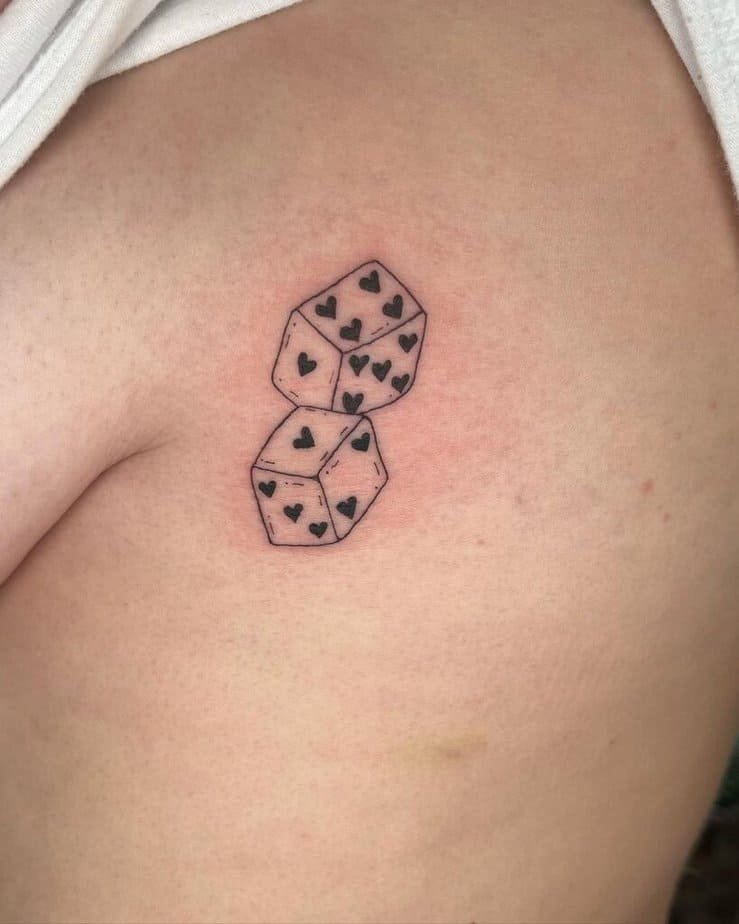 13. Dice tattoo on the rib