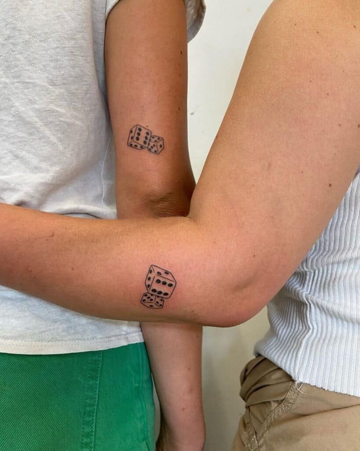 16. Another set of matching dice tattoos 
