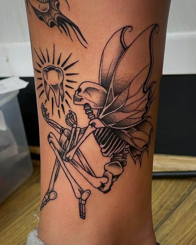 25. Legendary tooth fairy tattoo