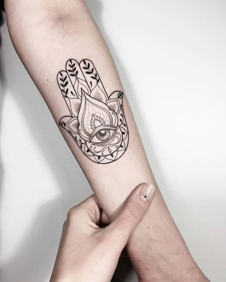 Eye within hamsa hand design