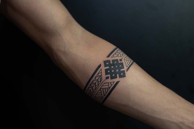 Geometric Celtic knot forearm band