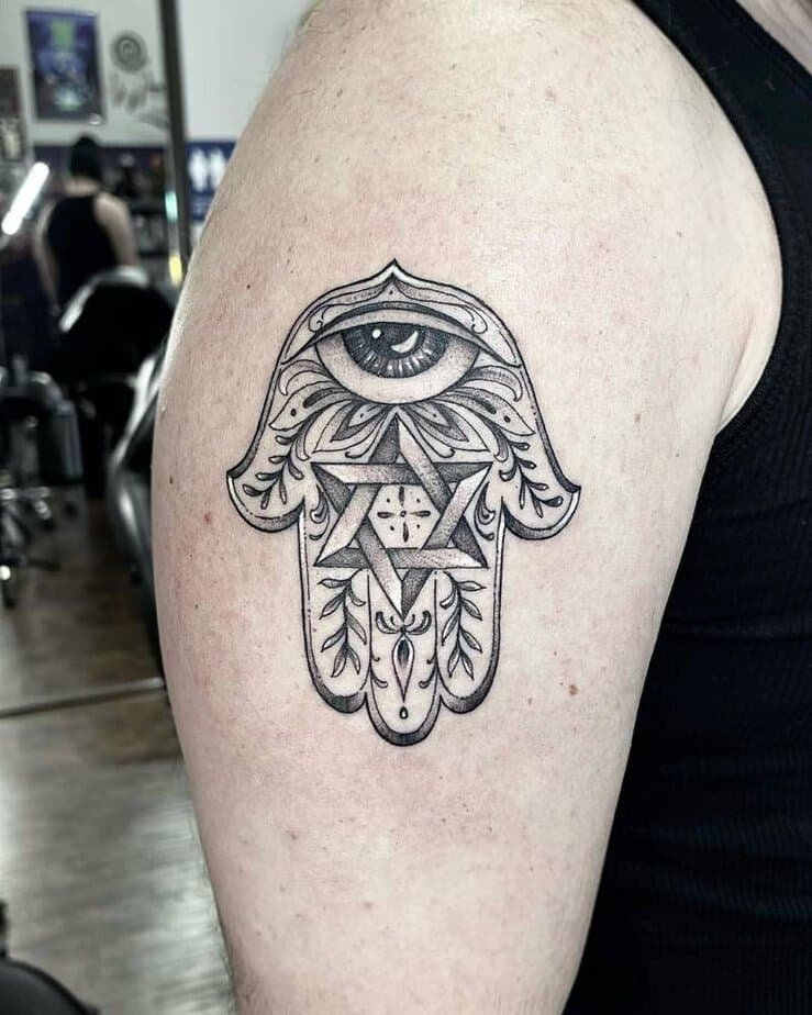 Geometric hamsa with all-seeing eye