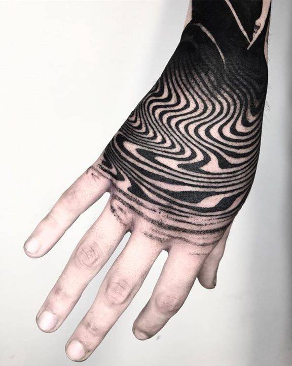 Hypnotic hand and wrist suminagashi design