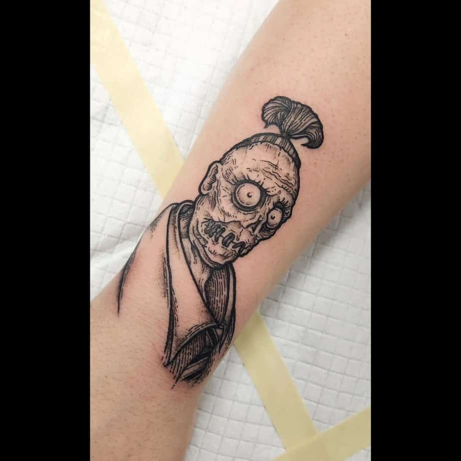 Shrunken head ghost tattoo