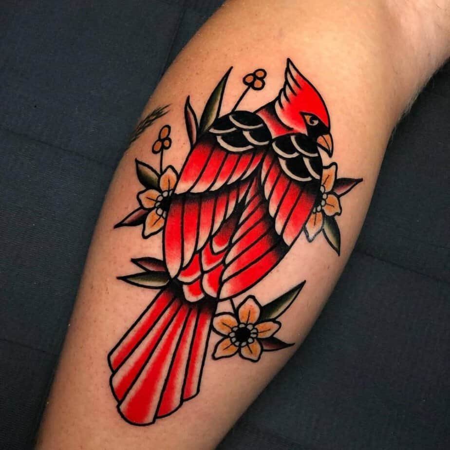 Bold traditional-style cardinal with flowers