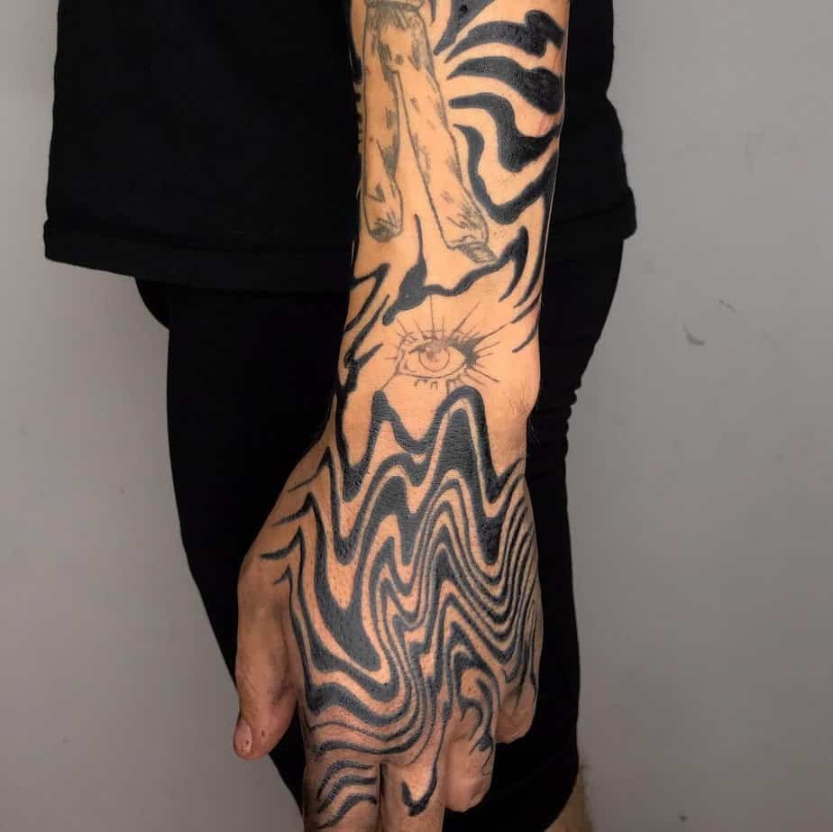 Distorted hand suminagashi with surreal eye detail