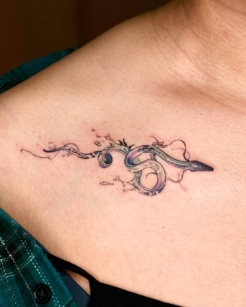 Serpentine dragon tattoo