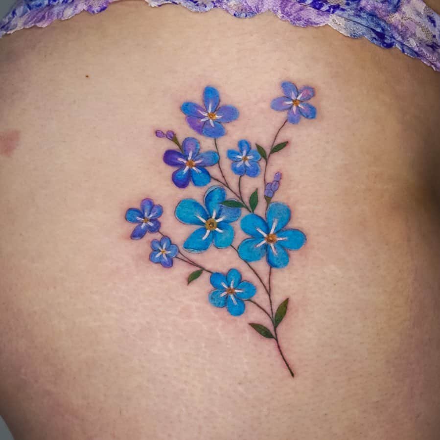 Bouquet of forget-me-nots tattoo