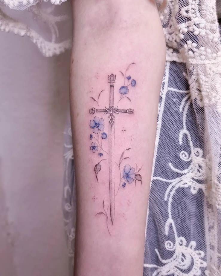 Sword with flowers tattoo