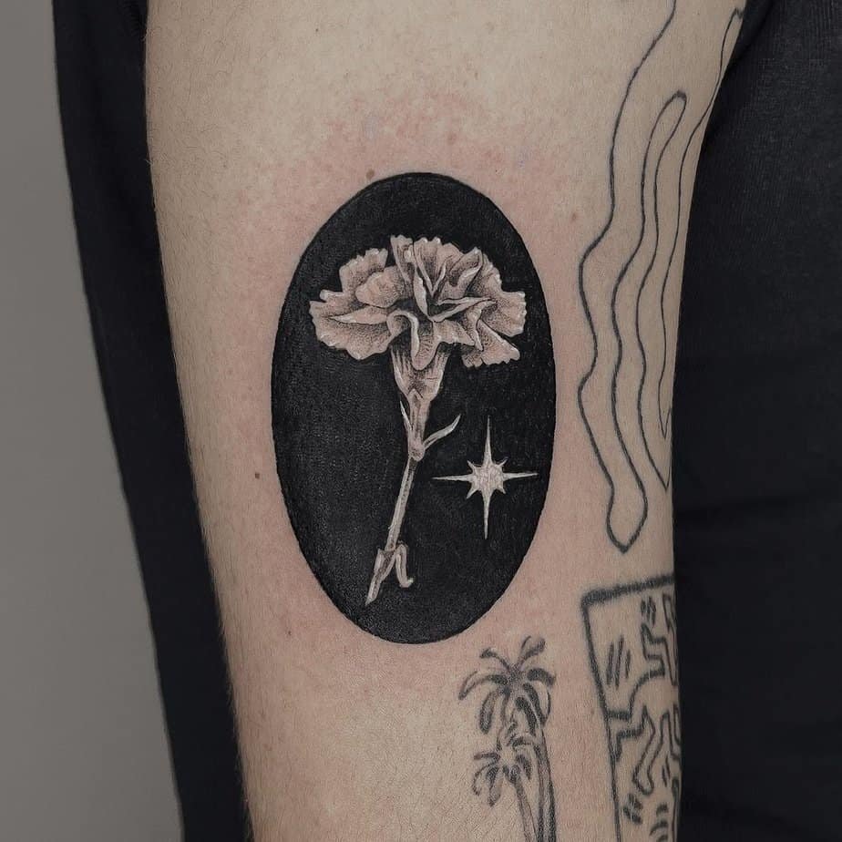 Blackwork frame tattoo